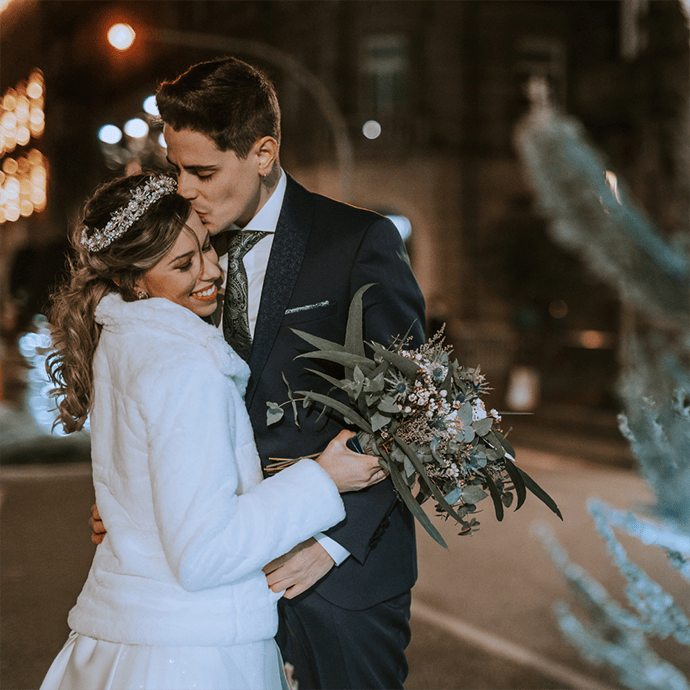 Christmas wedding newlywed couple bride holding winter bouquet - Camellio Wedding Planning and Events - Essex Wedding Planner