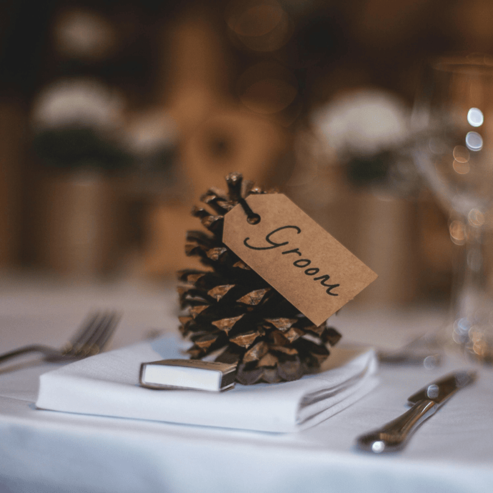 christmas weddding pine cone place name setting - Camellio Wedding Planning and Events - Essex Wedding Planner