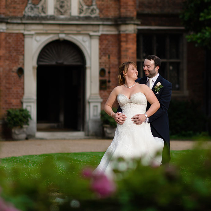 Couple outside country manor - Camellio Wedding Planning and Events - Essex Wedding Planner